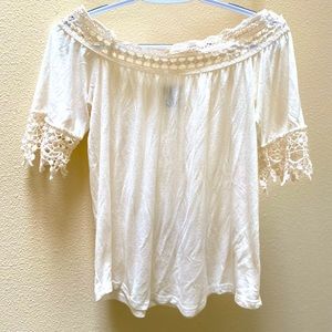 Off-shoulder off-white shirt